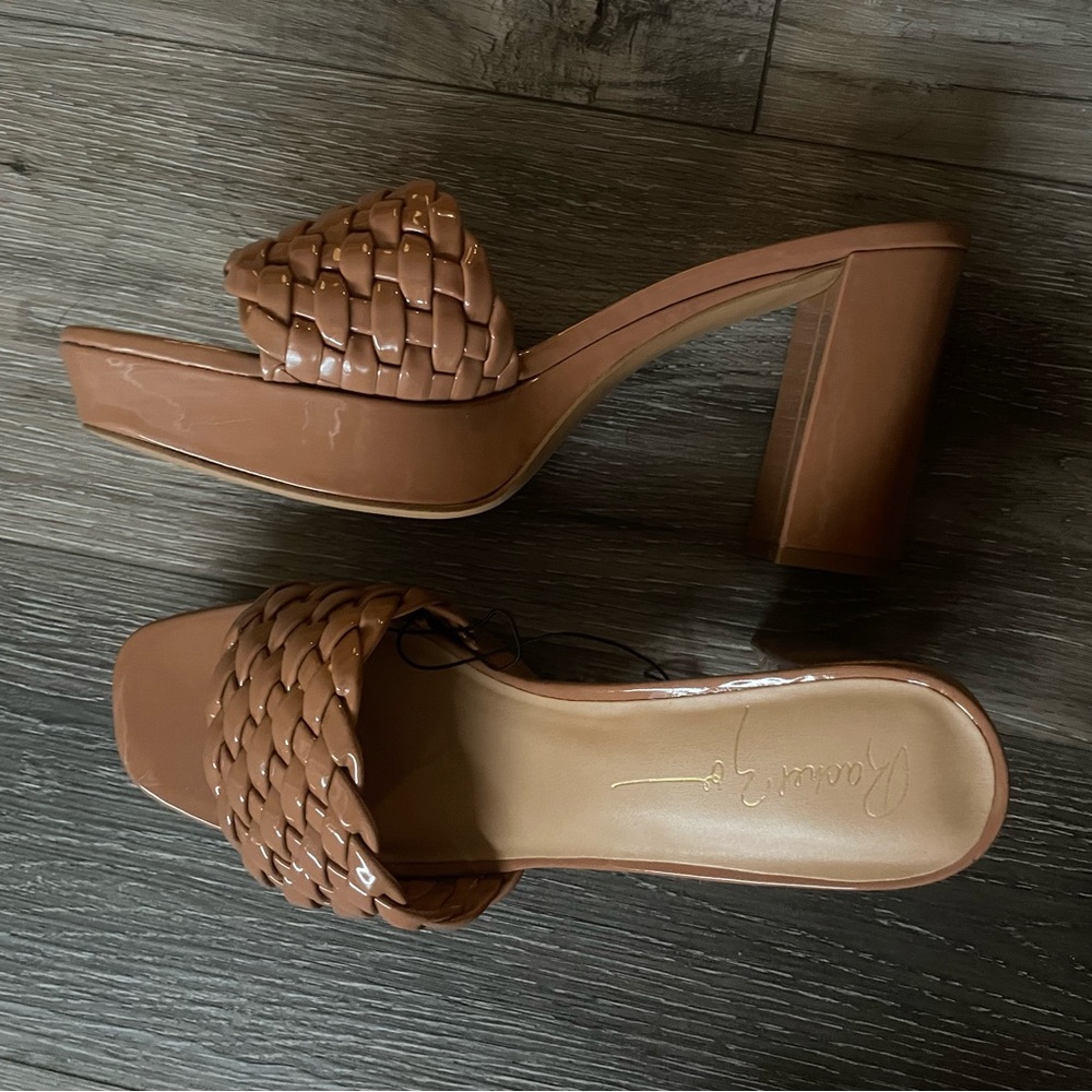 Tan heals. Brand new never worn